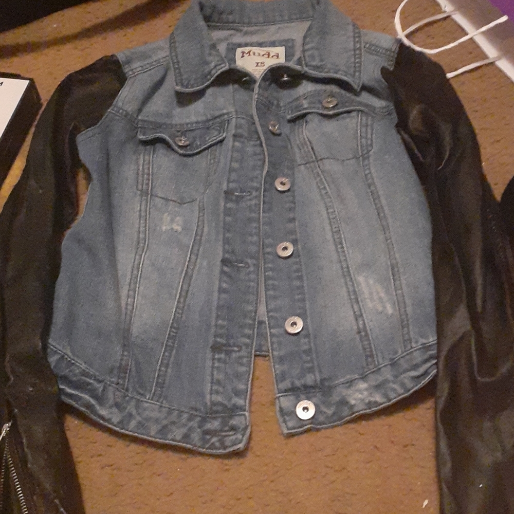 Denim jacket with faux leather sleeves